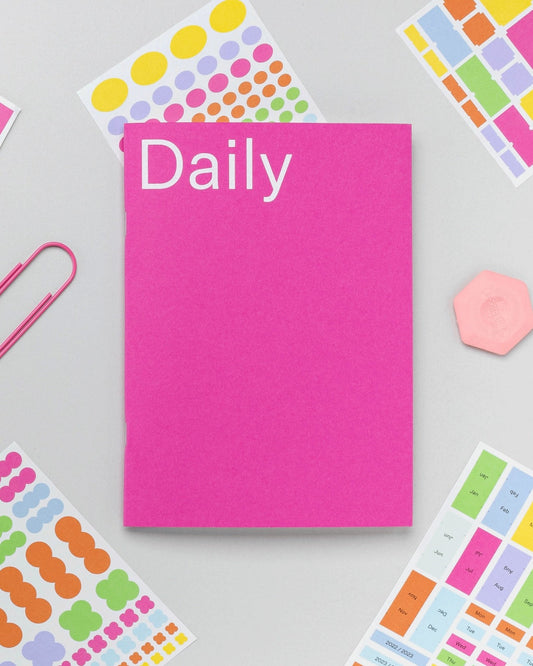 Undated planner with daily spreads. Color pink. 